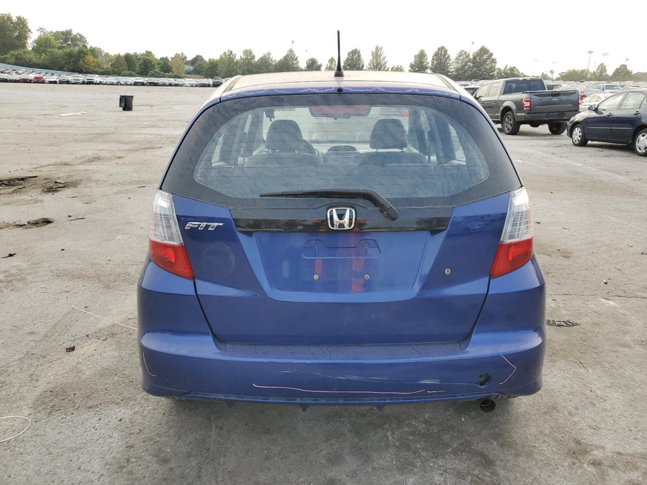 2010 Honda Fit VIN: JHMGE8H23AS027041 Lot: 82378025