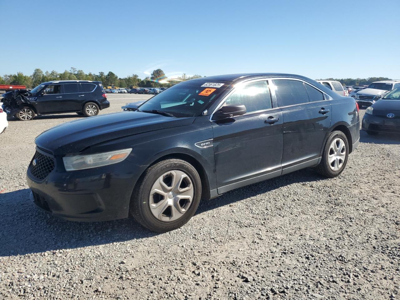 FORD TAURUS 2014. Lot# 82561825. VIN 1FAHP2MK0EG124487. Photo 1