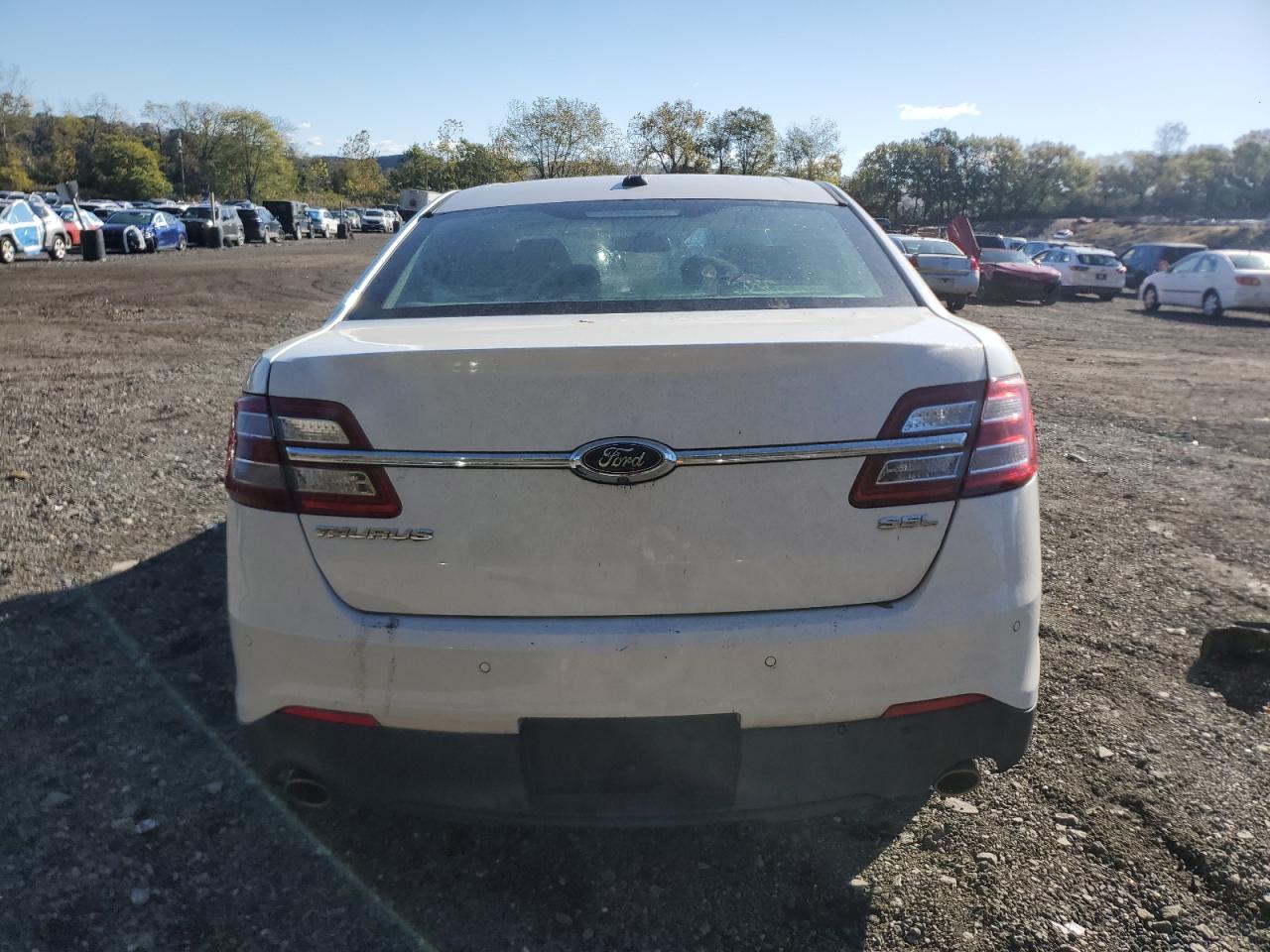 2015 Ford Taurus Sel VIN: 1FAHP2E8XFG134061 Lot: 82337055