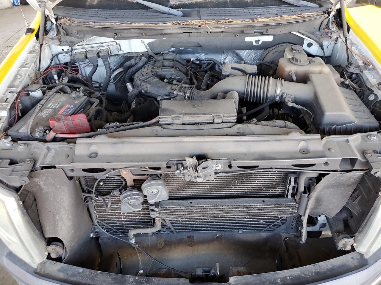 2011 Ford F150 VIN: 1FTMF1CMXBKD98216 Lot: 82311385