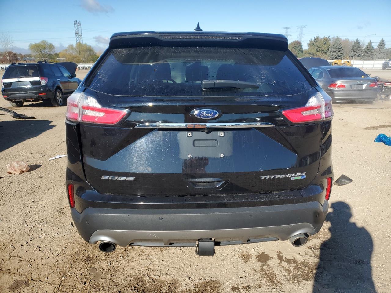 2019 Ford Edge Titanium VIN: 2FMPK4K91KBB87192 Lot: 90128495