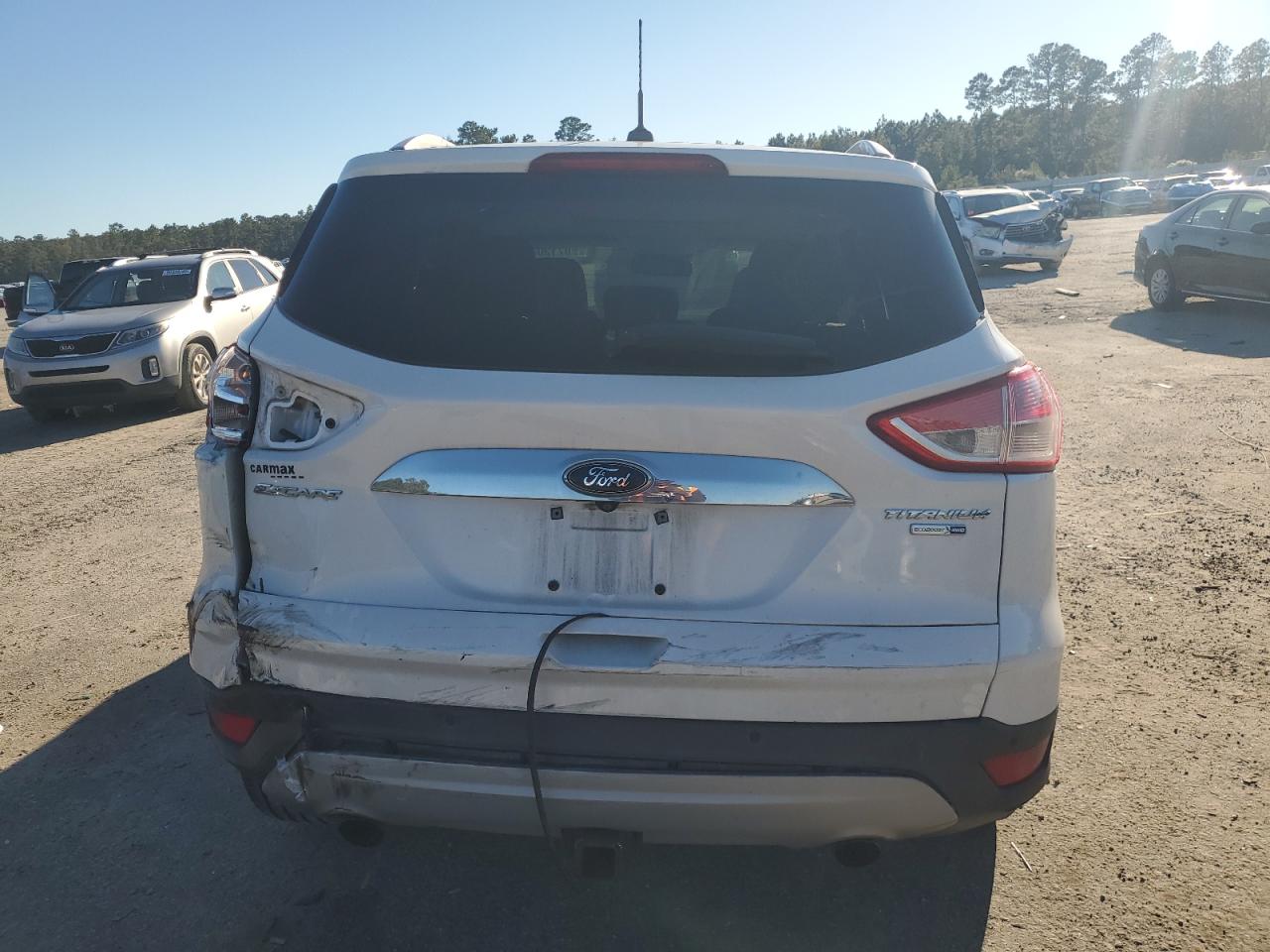 2016 Ford Escape Titanium VIN: 1FMCU9J91GUB78260 Lot: 90712045