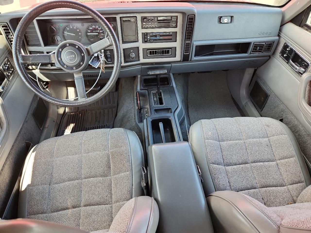 1990 Jeep Cherokee Laredo VIN: 1J4FJ58L0LL208654 Lot: 84260585