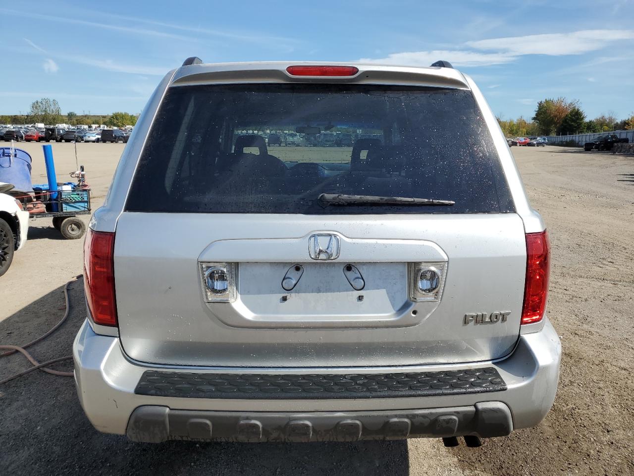 2005 Honda Pilot Ex VIN: 2HKYF18455H003100 Lot: 82081895