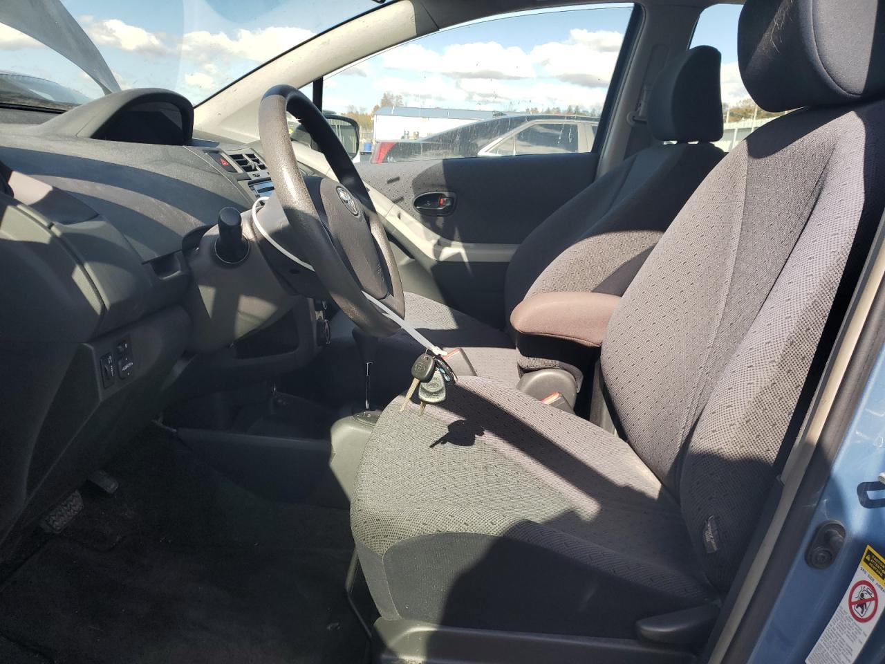 2009 Toyota Yaris VIN: JTDKT903X95232992 Lot: 90540085