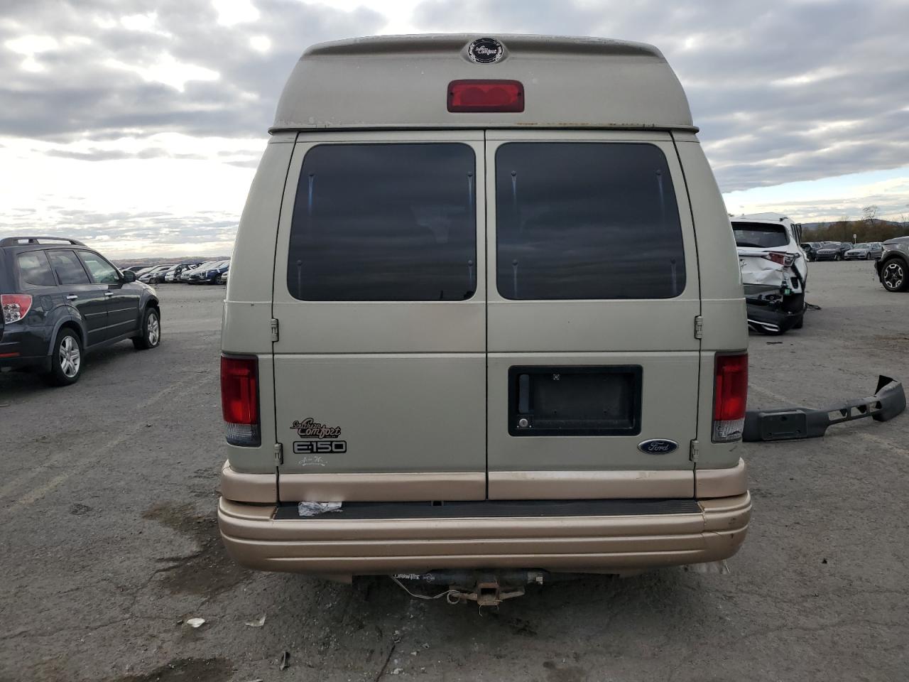 2004 Ford Econoline E150 Van VIN: 1FDRE14LX4HA54850 Lot: 90669475