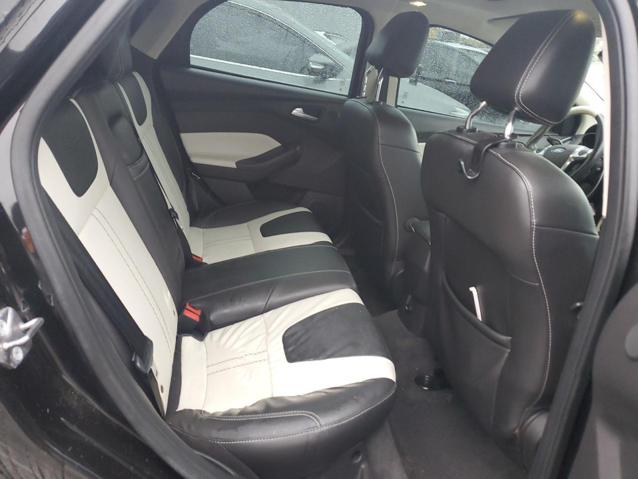 2012 Ford Focus Titanium VIN: 1FAHP3N2XCL324270 Lot: 89924235