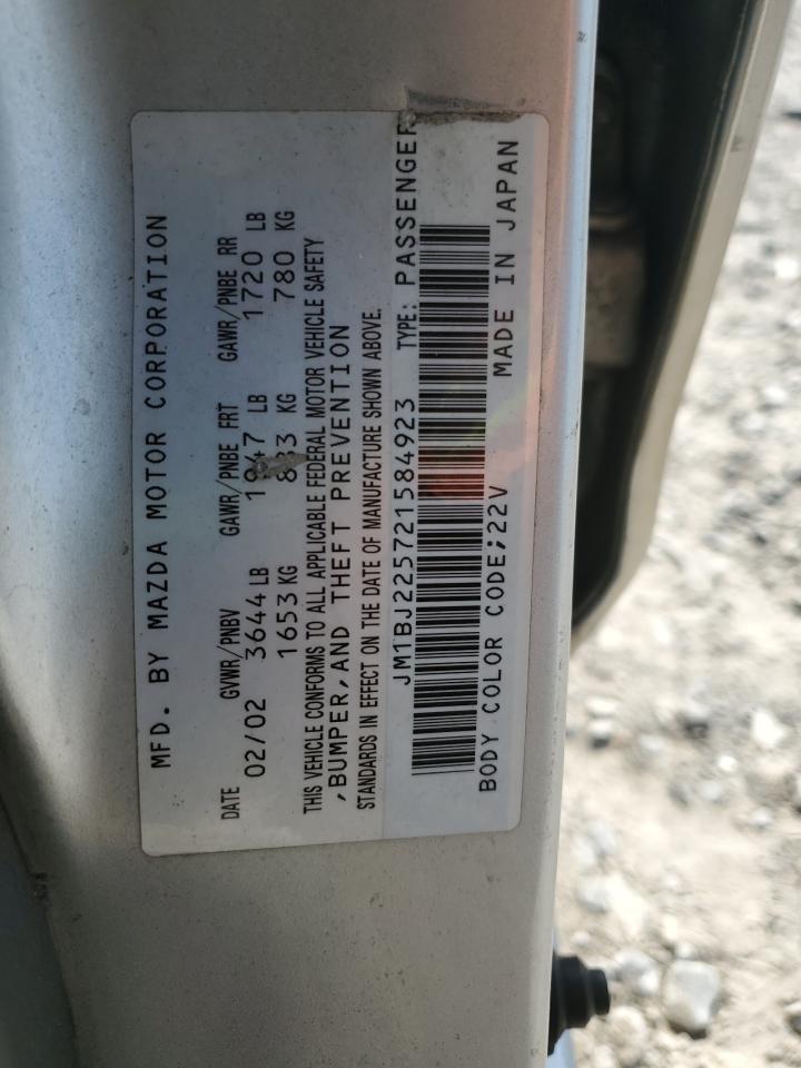 2002 Mazda Protege VIN: JM1BJ225721584923 Lot: 82630595