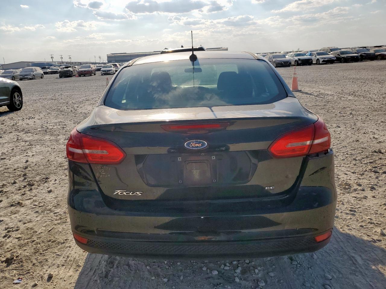 2017 Ford Focus Se VIN: 1FADP3F24HL244791 Lot: 84973435