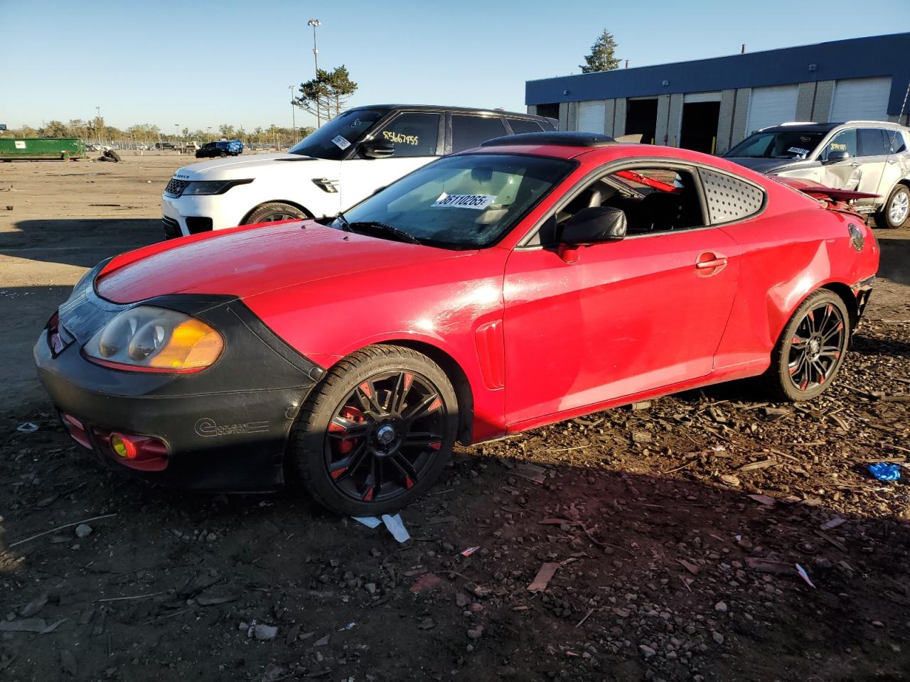 HYUNDAI TIBURON 2003. Lot# 86110265. VIN KMHHN65F23U006332. Photo 1