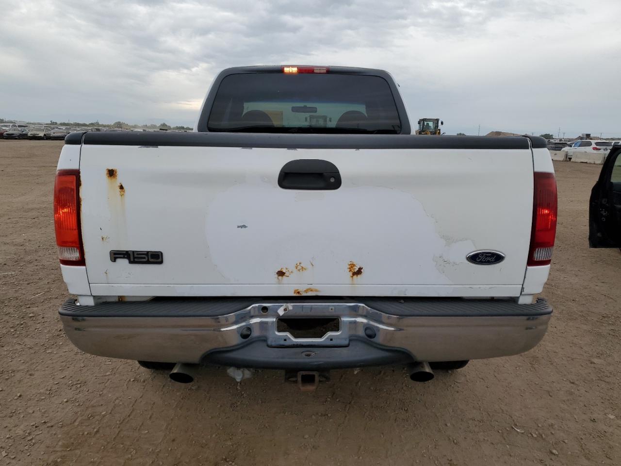 2001 Ford F150 VIN: 1FTRX18L01KF00186 Lot: 86135485