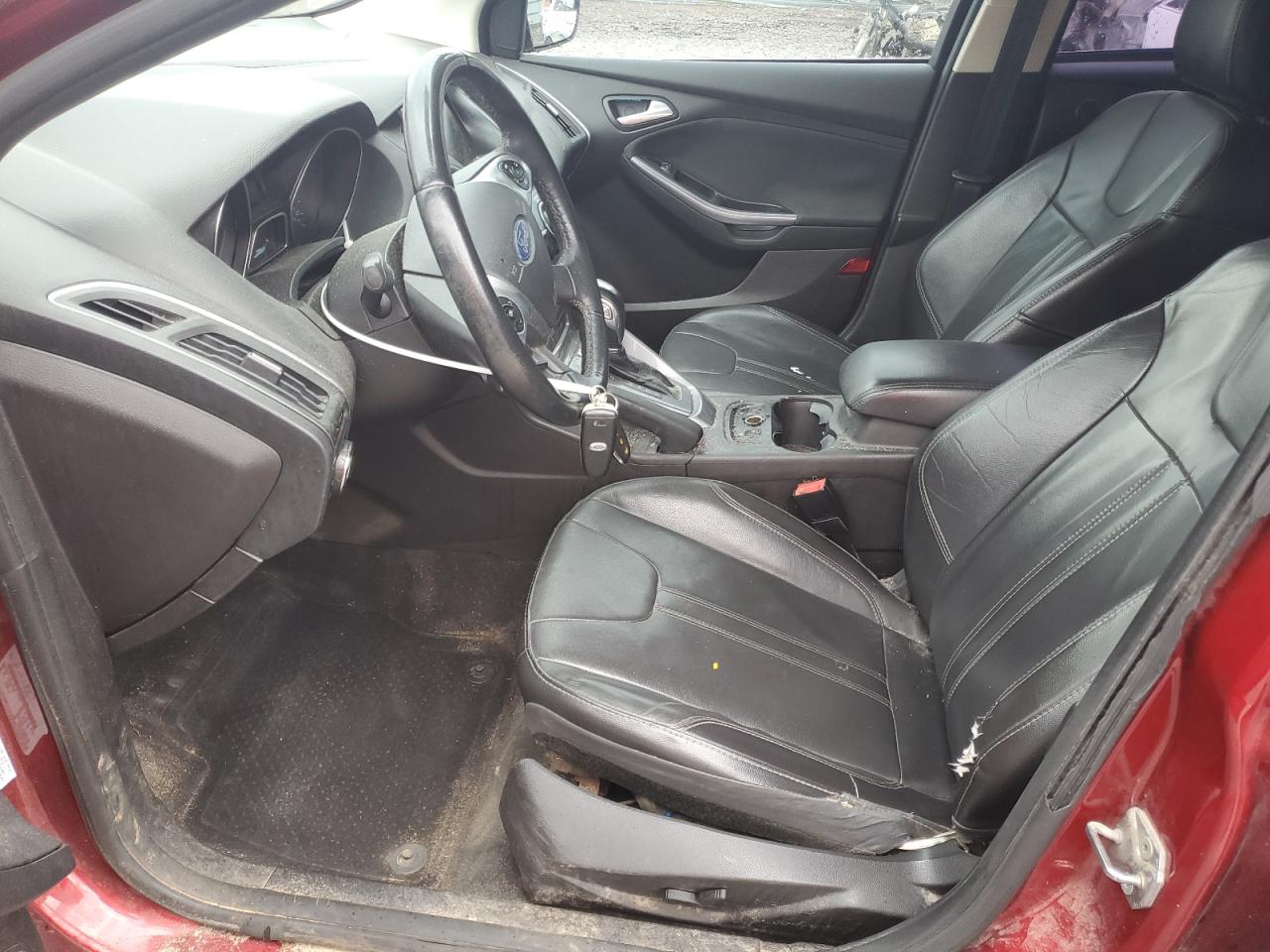 2014 Ford Focus Titanium VIN: 1FADP3N25EL380733 Lot: 84982525