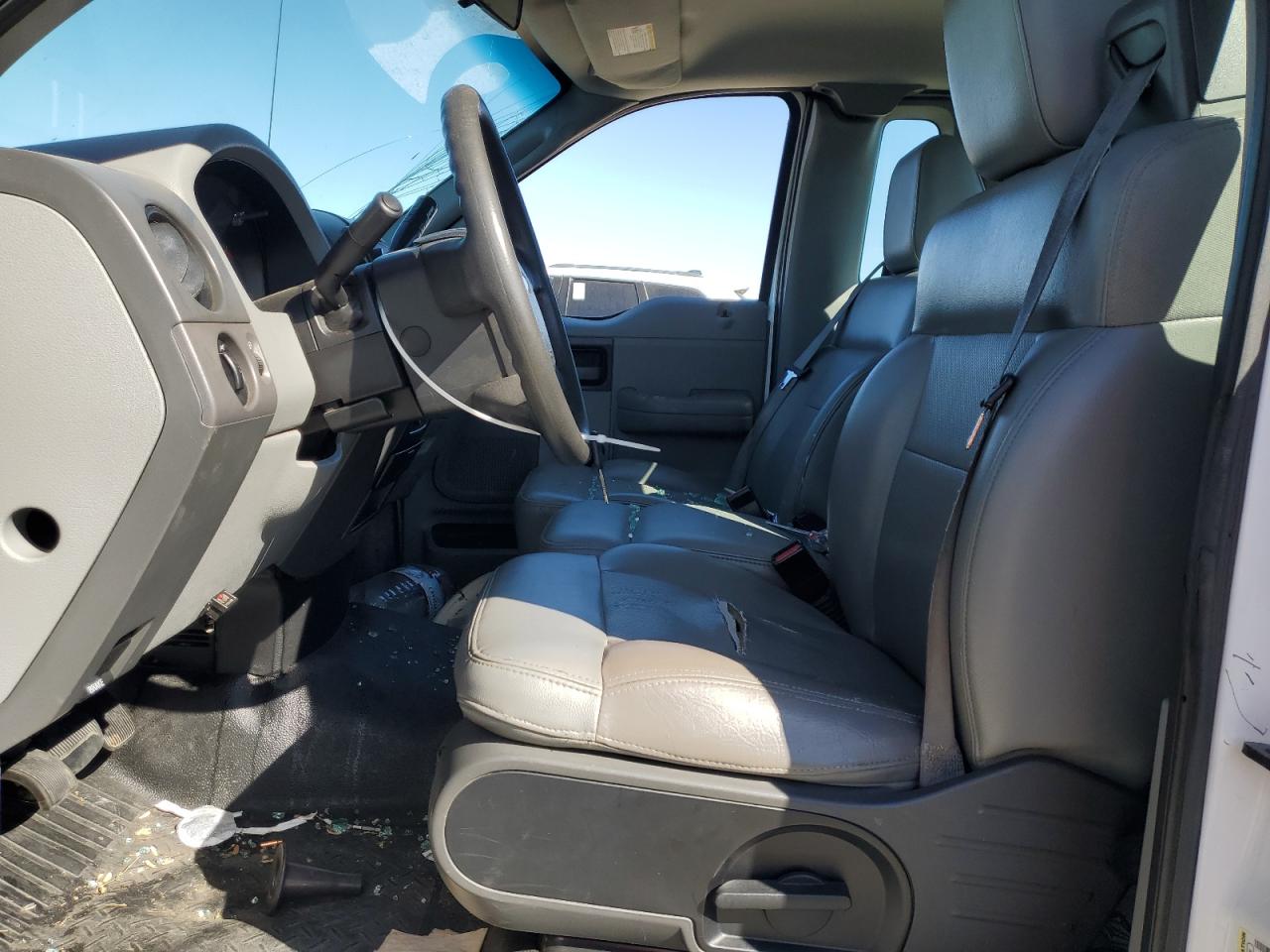 2007 Ford F150 VIN: 1FTRF12277NA10256 Lot: 82405955
