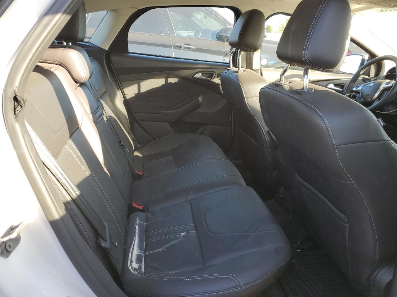 2012 Ford Focus Titanium VIN: 1FAHP3N21CL202879 Lot: 80838925