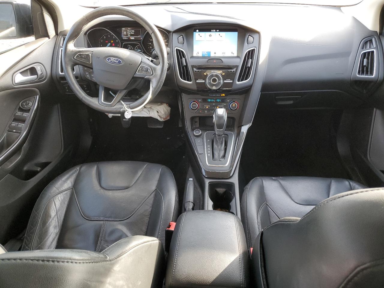 2016 Ford Focus Titanium VIN: 1FADP3J25GL312604 Lot: 85146455