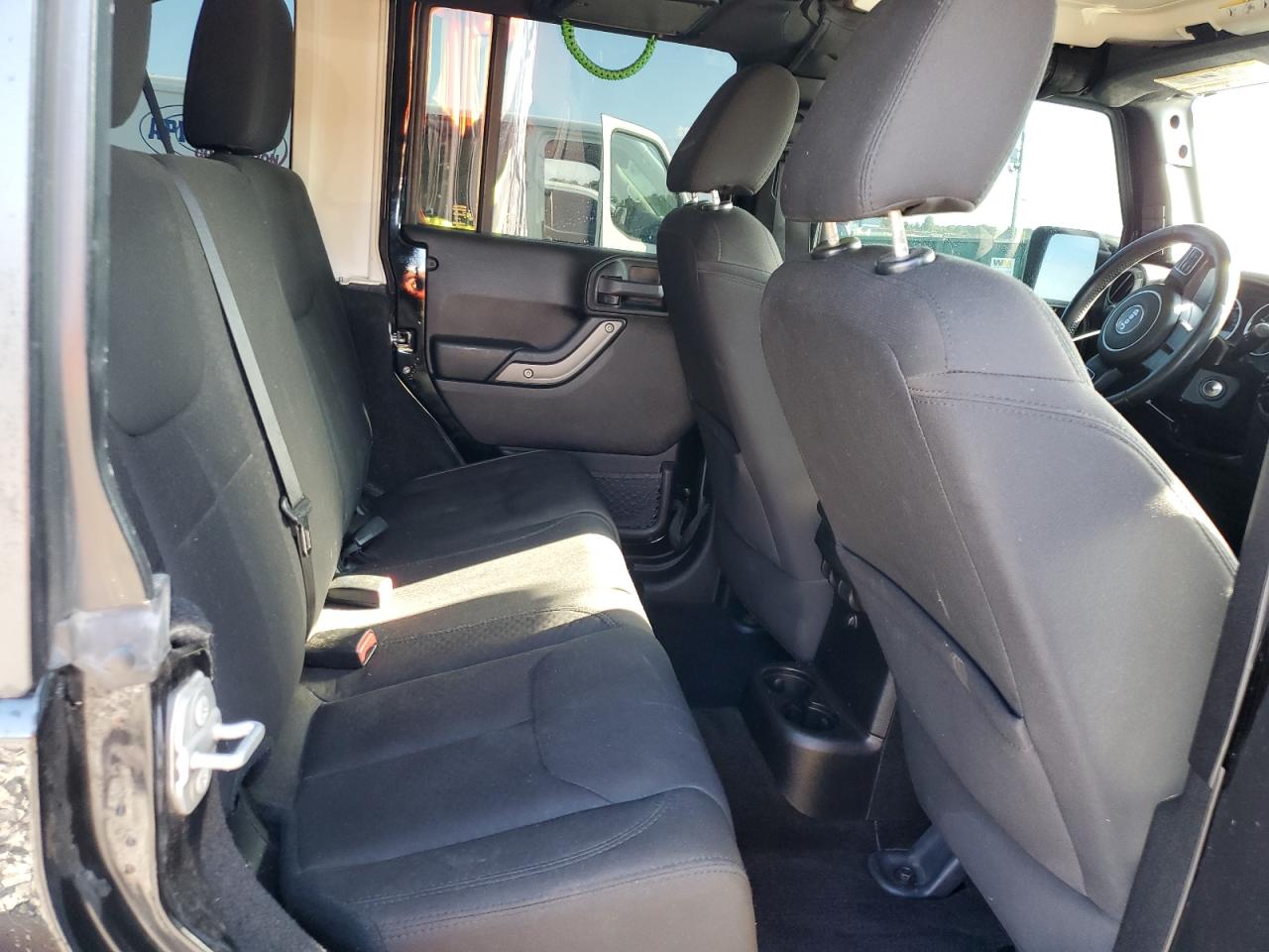 2015 Jeep Wrangler Unlimited Sport VIN: 1C4BJWDG9FL771032 Lot: 85364425