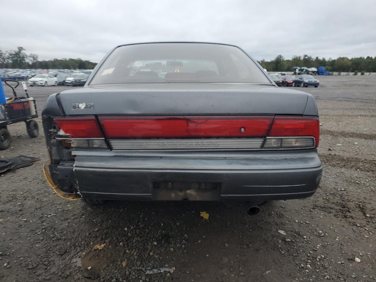 1992 Nissan Maxima Gxe VIN: JN1HJ01F5NT008400 Lot: 82392595
