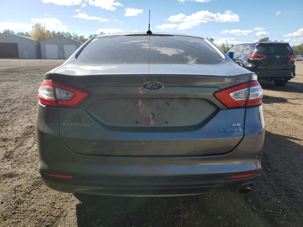 2013 Ford Fusion Se Hybrid VIN: 3FA6P0LUXDR286083 Lot: 85820335