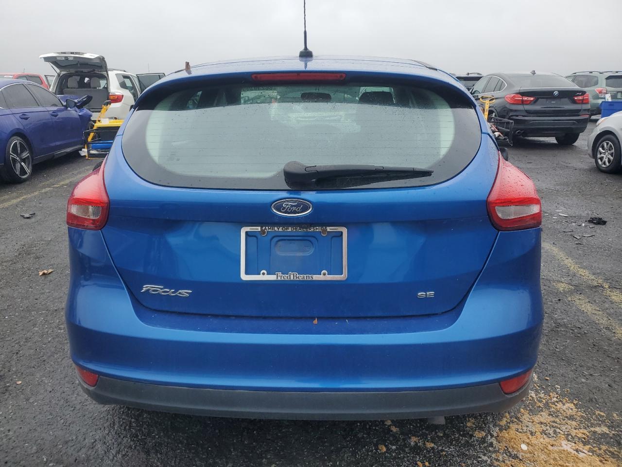 2018 Ford Focus Se VIN: 1FADP3K29JL318704 Lot: 86239395