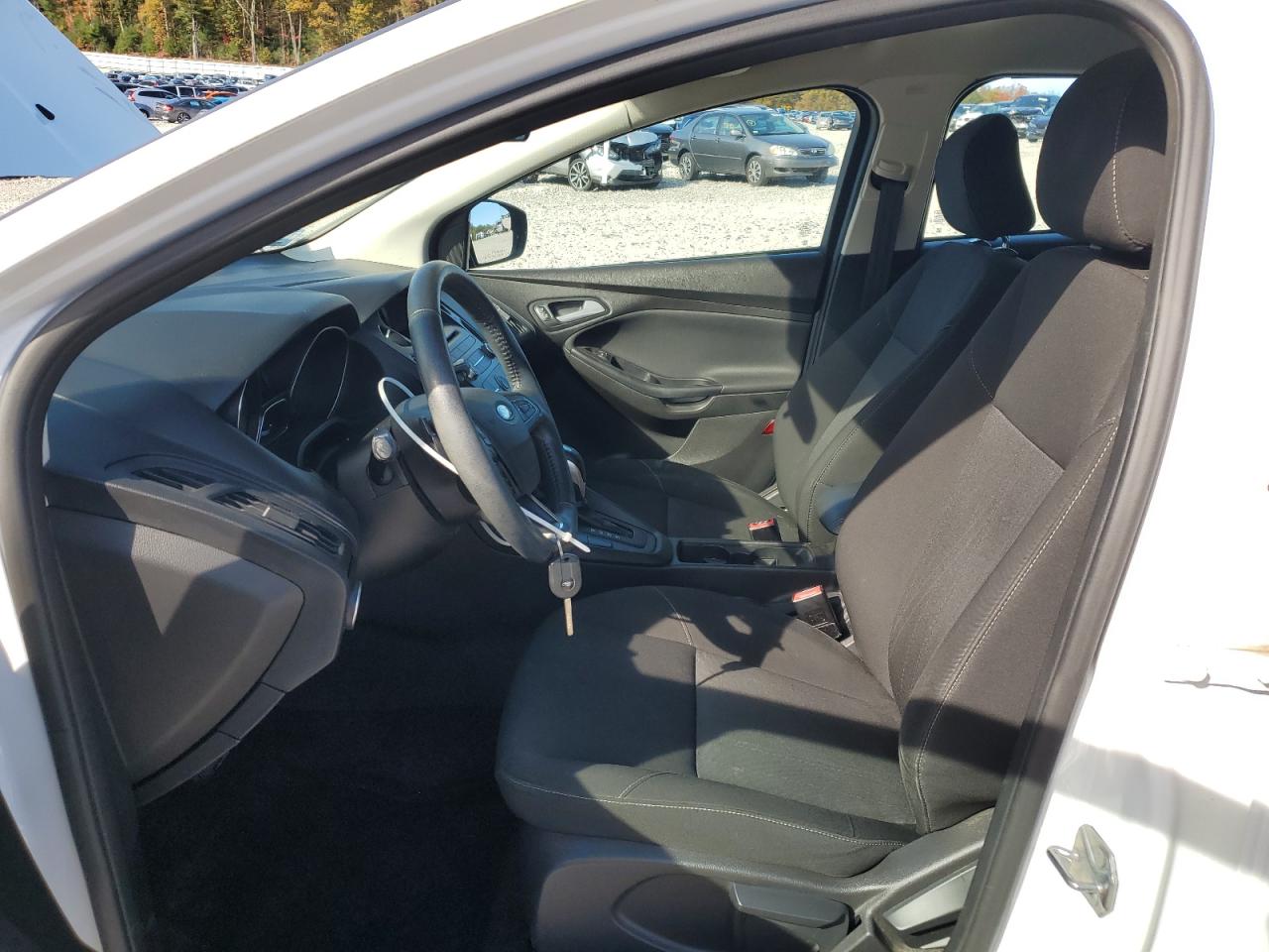 2015 Ford Focus Se VIN: 1FADP3K27FL321026 Lot: 86809455