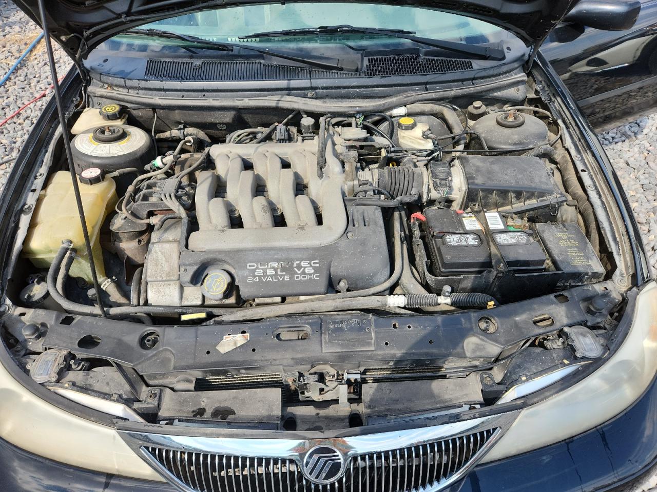 1999 Mercury Mystique Ls VIN: 1MEFM66L7XK610610 Lot: 85193725