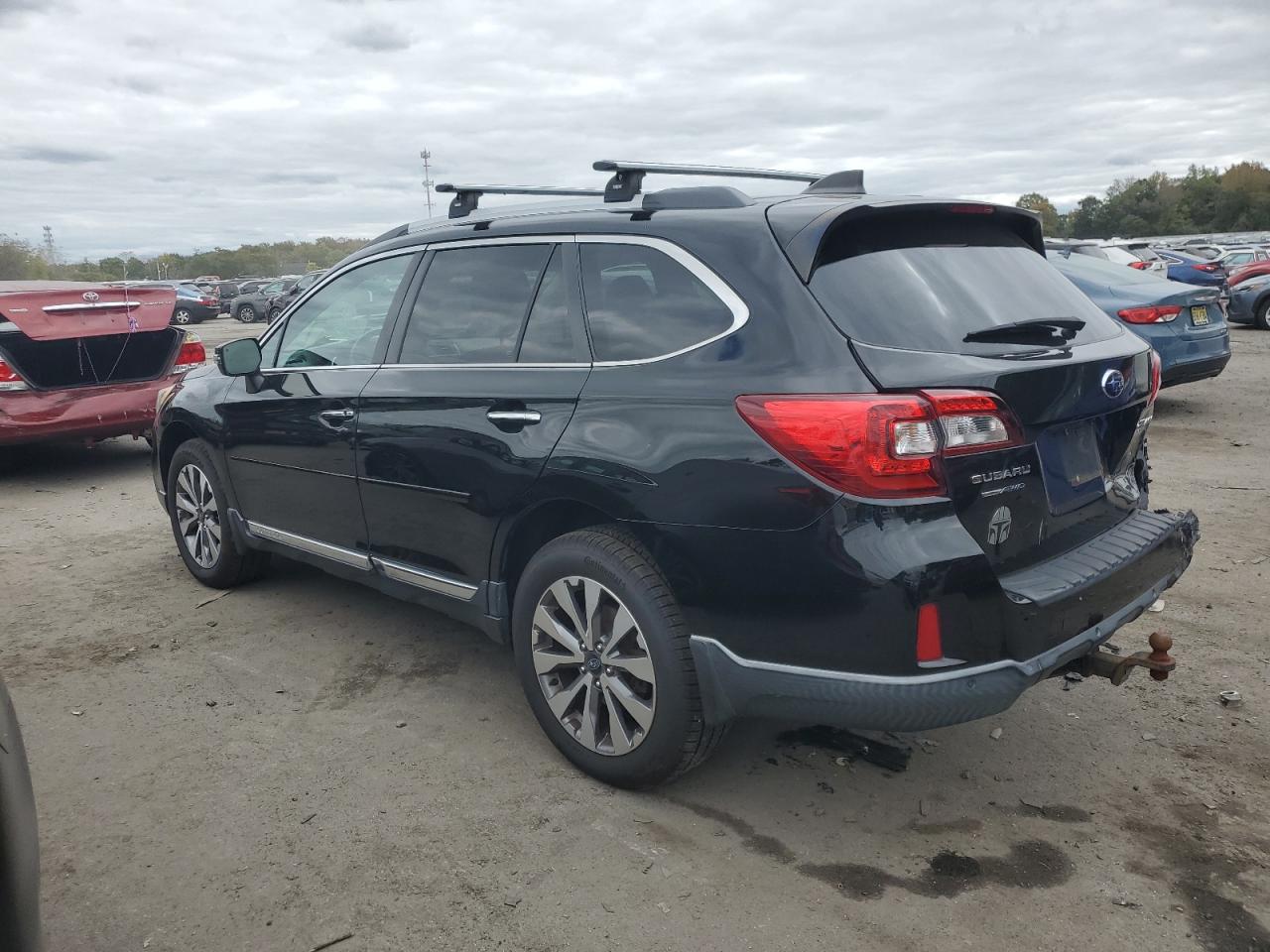 2017 Subaru Outback Touring VIN: 4S4BSATC1H3282296 Lot: 85474465