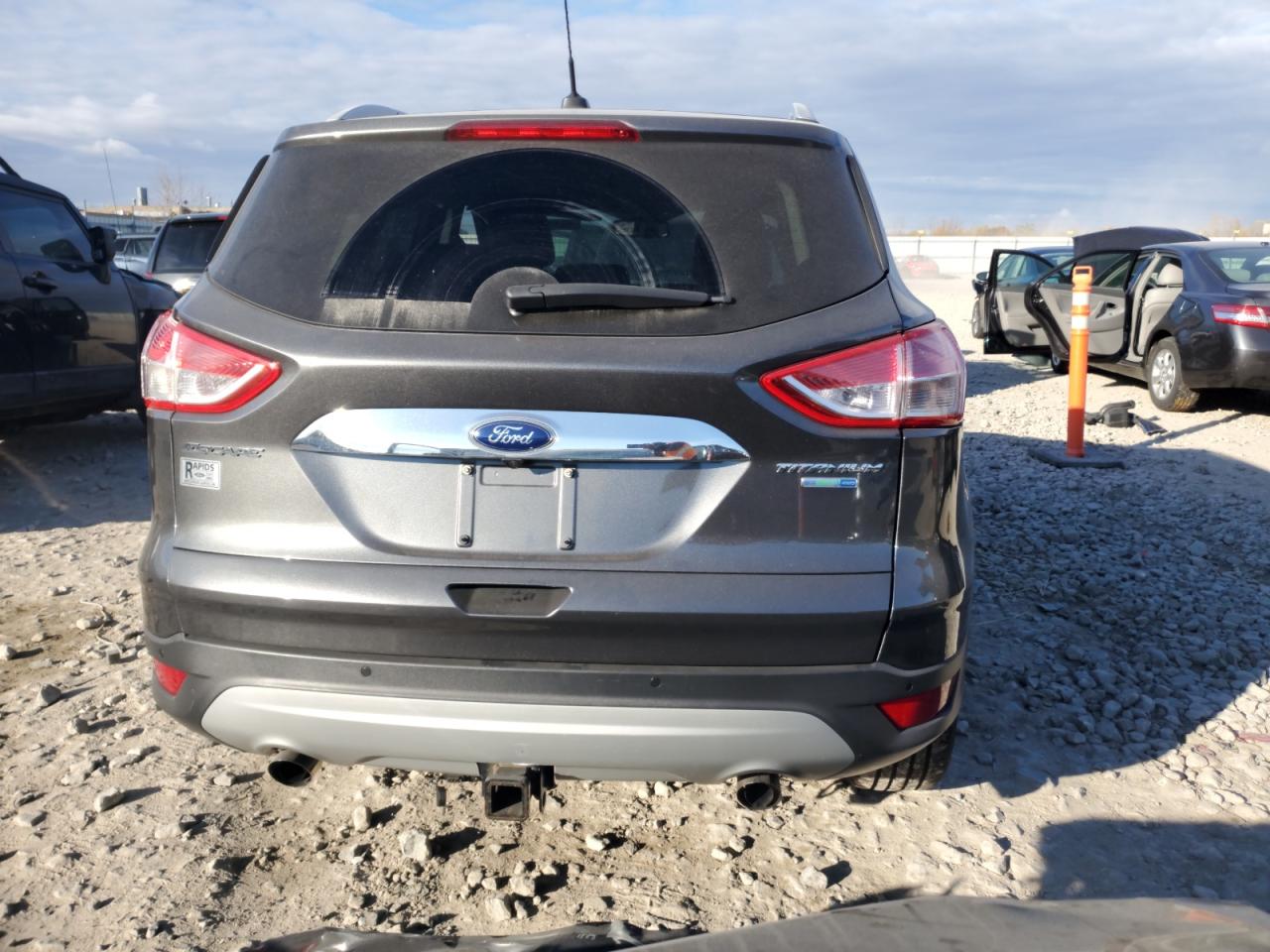 2015 Ford Escape Titanium VIN: 1FMCU9J98FUC07283 Lot: 90385465