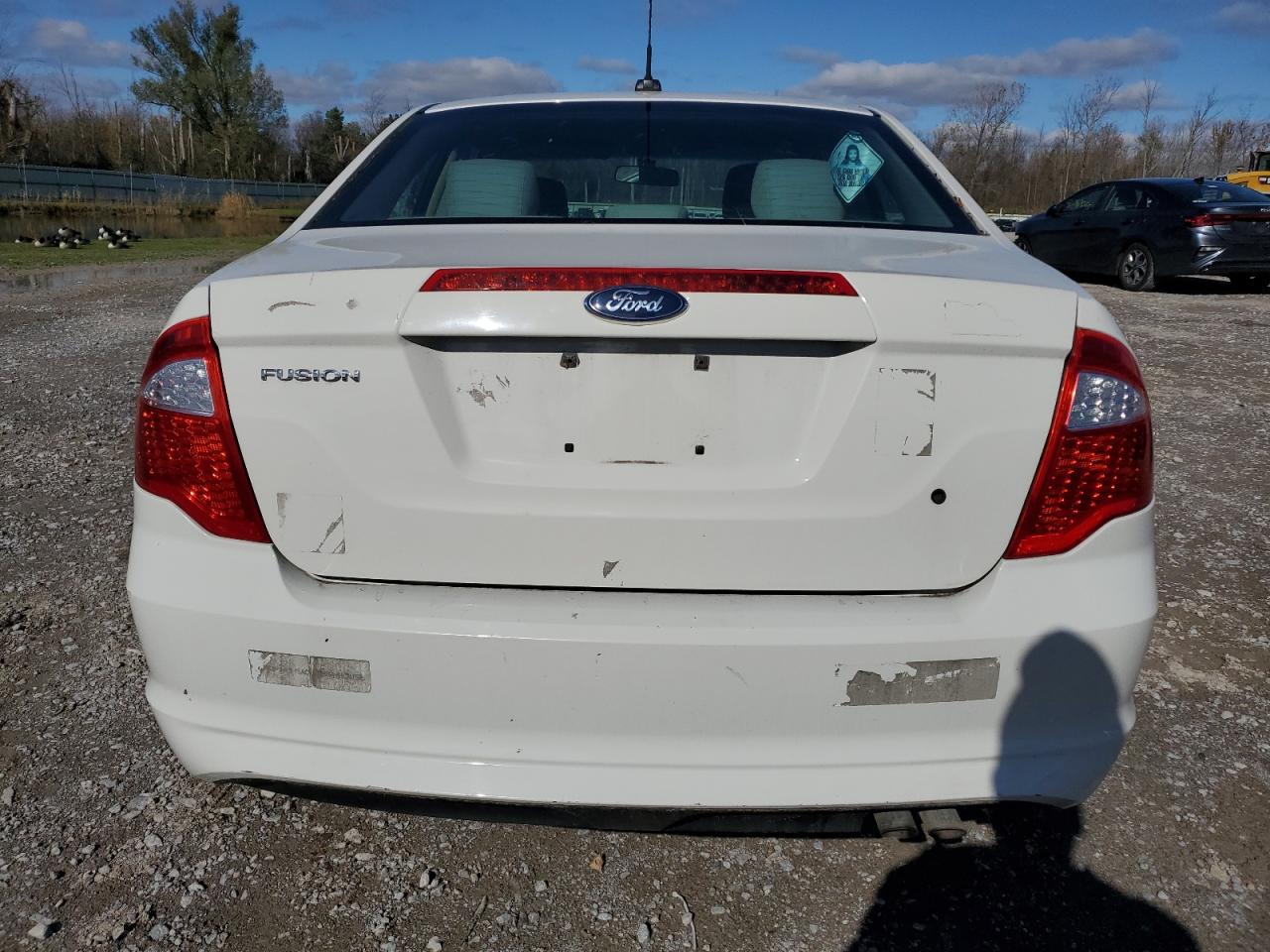 2011 Ford Fusion S VIN: 3FAHP0GA9BR266204 Lot: 90035345