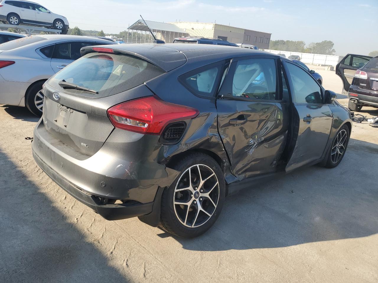 2017 Ford Focus Sel VIN: 1FADP3M26HL244990 Lot: 84960555