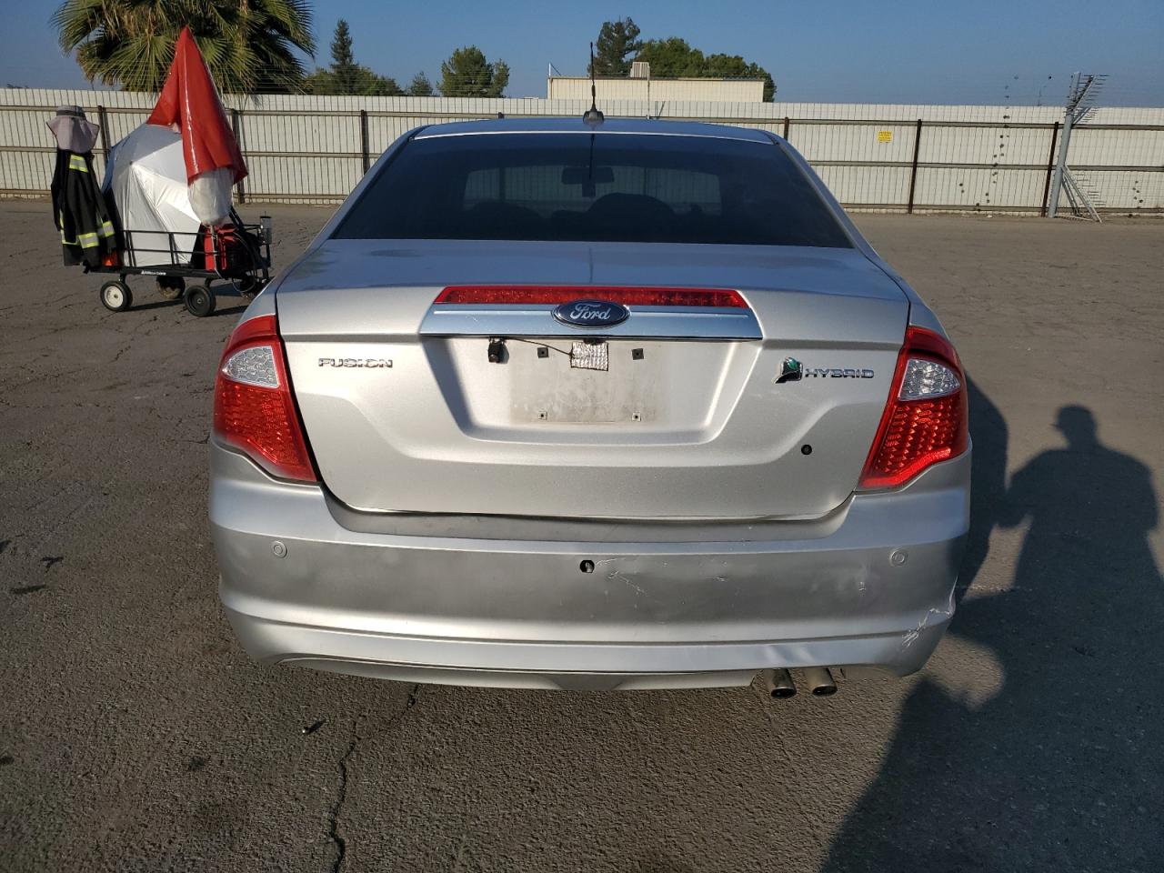 2010 Ford Fusion Hybrid VIN: 3FADP0L37AR303383 Lot: 82659975