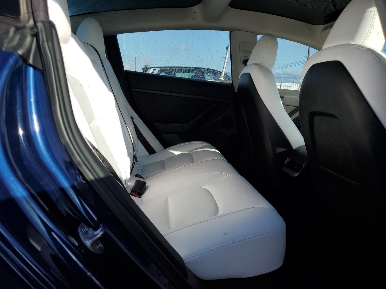 2023 Tesla Model 3 VIN: 5YJ3E1EA6PF703703 Lot: 86488255