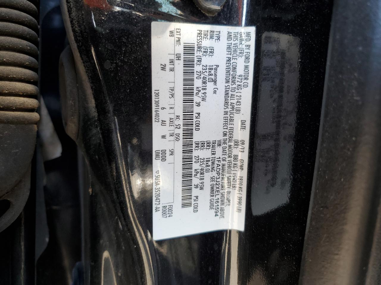 2014 Ford Focus Titanium VIN: 1FADP3J2XEL161594 Lot: 82163935