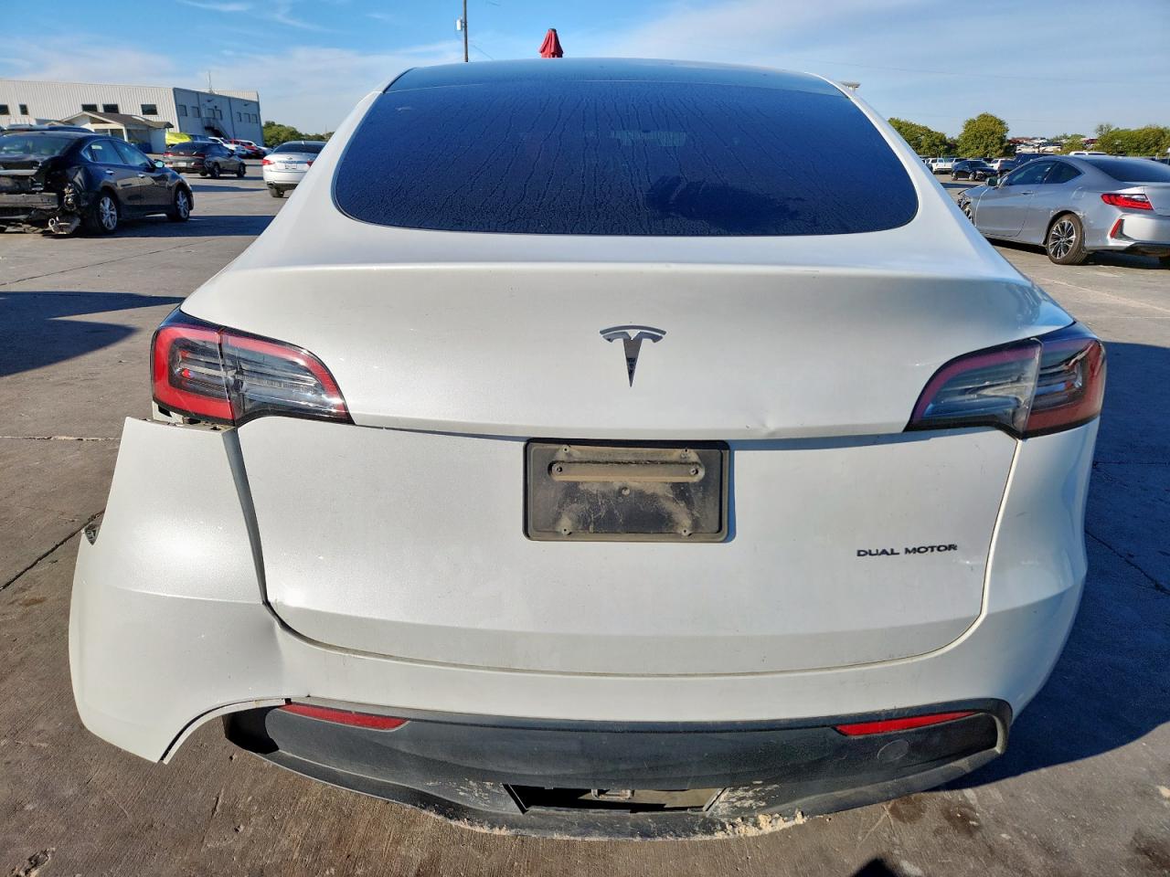 2023 Tesla Model Y VIN: 7SAYGAEEXPF60116 Lot: 90636225