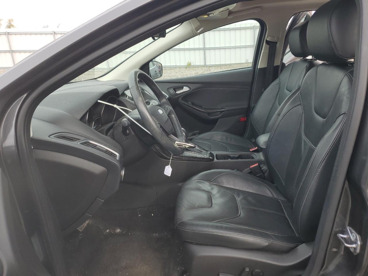 2017 Ford Focus Titanium VIN: 1FADP3N23HL243147 Lot: 82672225