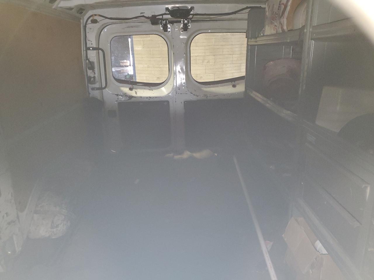 2014 Nissan Nv 1500 Van VIN: 1N6BF0KY0EN105378 Lot: 90404215