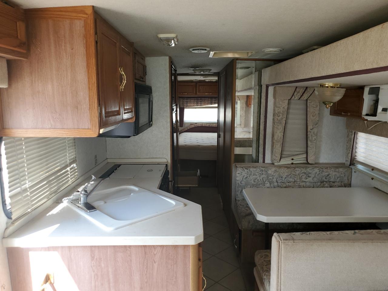 1999 Ford Super Duty F-550 Mot VIN: 3FCMF53S8XJA14456 Lot: 85106085