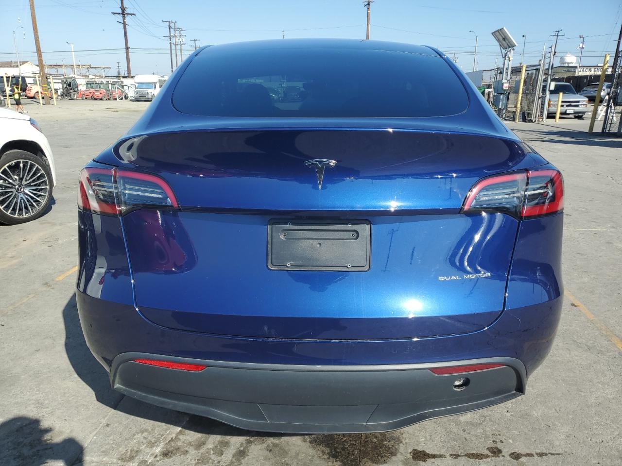 2023 Tesla Model Y VIN: 7SAYGDEE9PA077875 Lot: 85007555