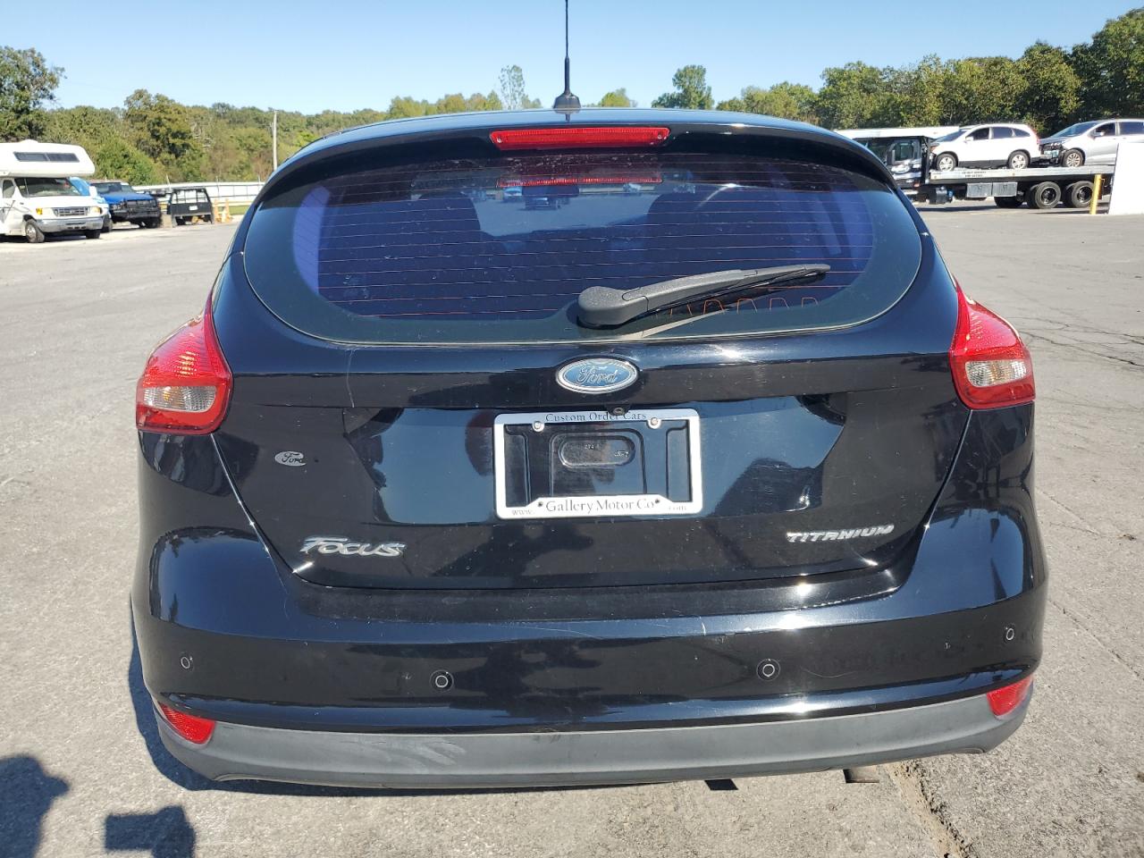 2017 Ford Focus Titanium VIN: 1FADP3N2XHL204765 Lot: 84995315