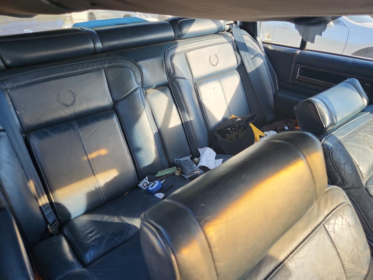 1990 Cadillac Deville VIN: 1G6CD5337L4319321 Lot: 82552015