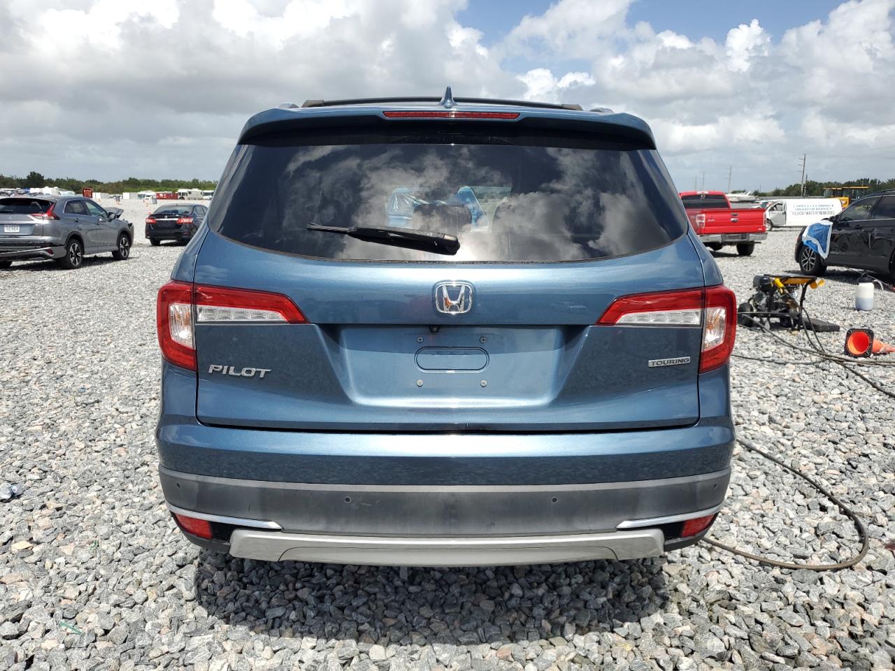 2021 Honda Pilot Touring VIN: 5FNYF5H94MB007493 Lot: 85137925