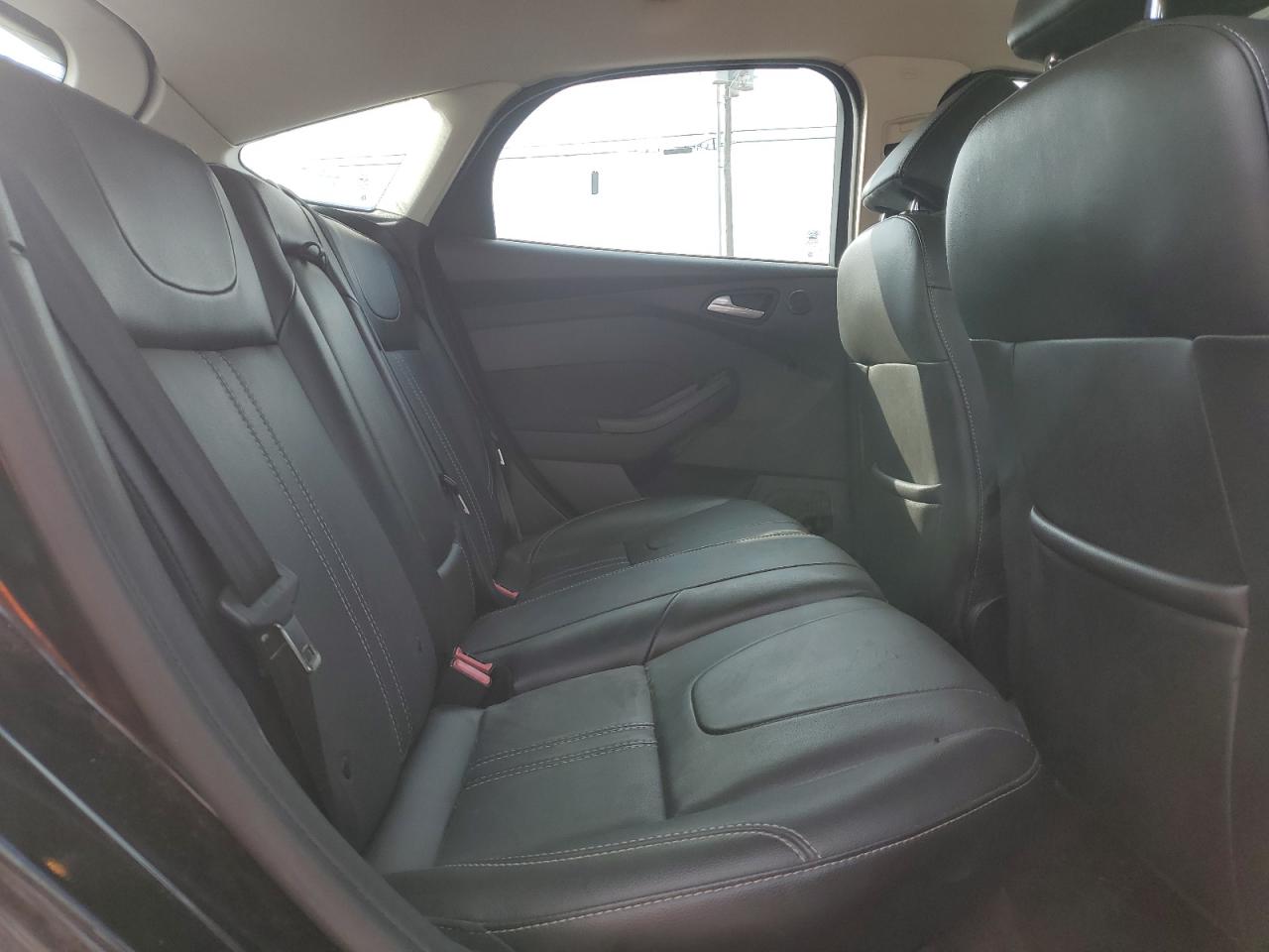 2014 Ford Focus Titanium VIN: 1FADP3N29EL357097 Lot: 86432545