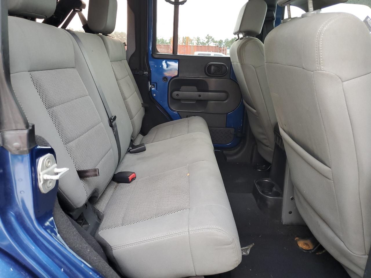 2009 Jeep Wrangler Unlimited Sahara VIN: 1J8GB59149L713277 Lot: 85342455