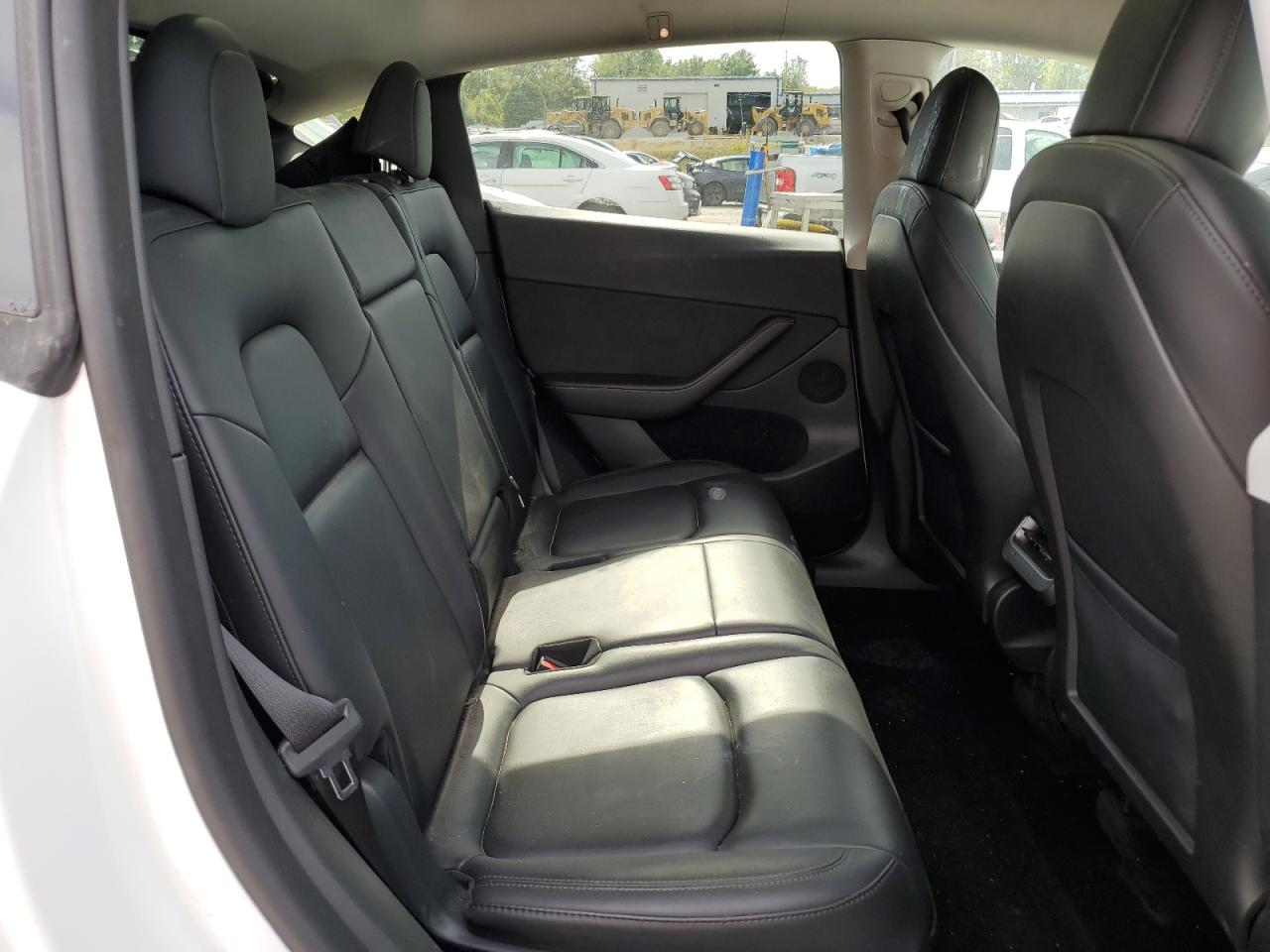 2023 Tesla Model Y VIN: 7SAYGAEE1PF596629 Lot: 84890935