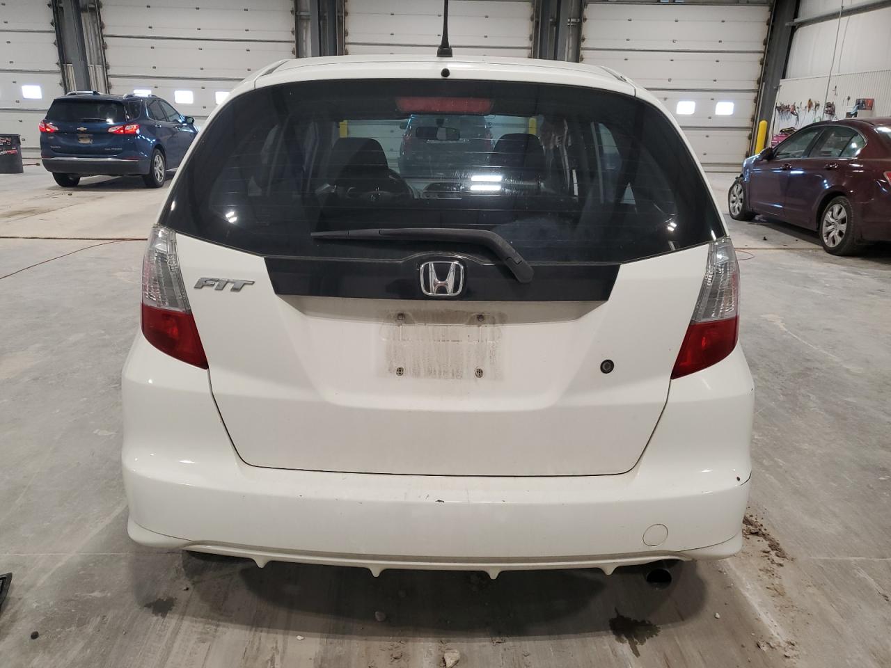 2010 Honda Fit VIN: JHMGE8H24AC022991 Lot: 90573465