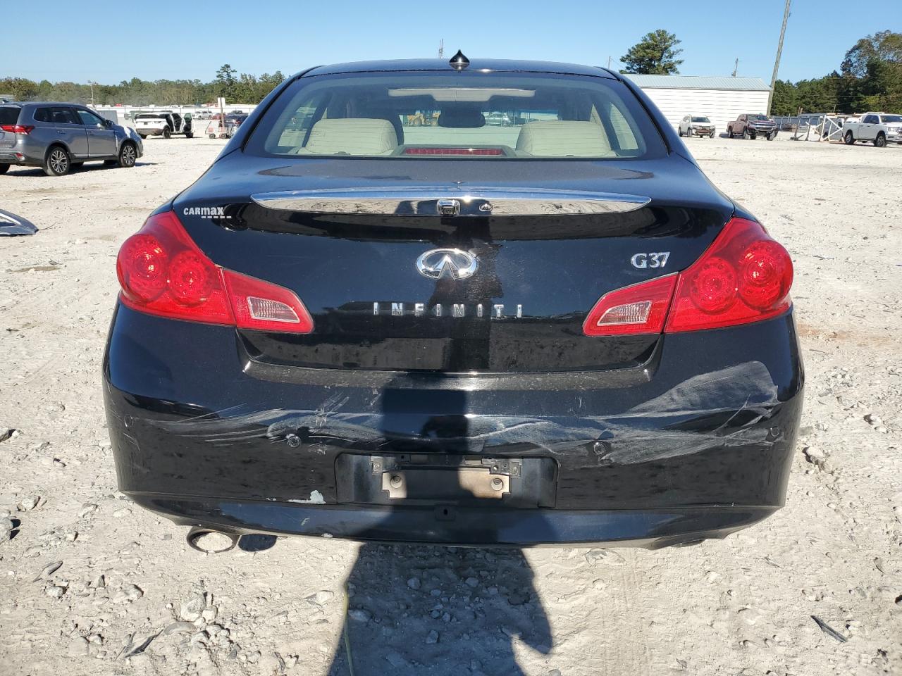 2011 Infiniti G37 Base VIN: JN1CV6APXBM301693 Lot: 86491055