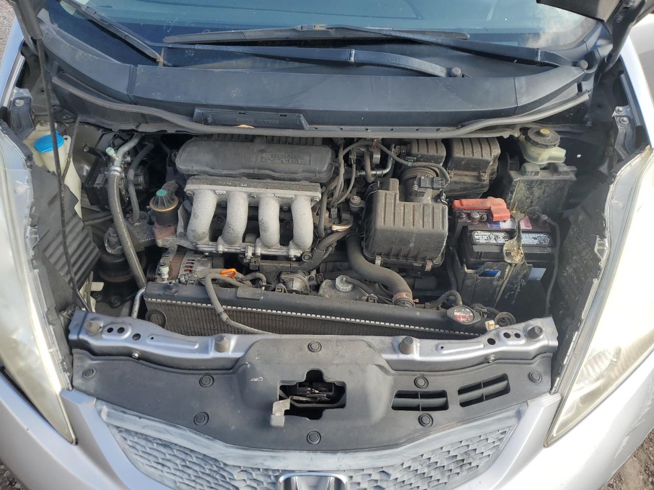 2009 Honda Fit Sport VIN: JHMGE88459S012411 Lot: 82374695