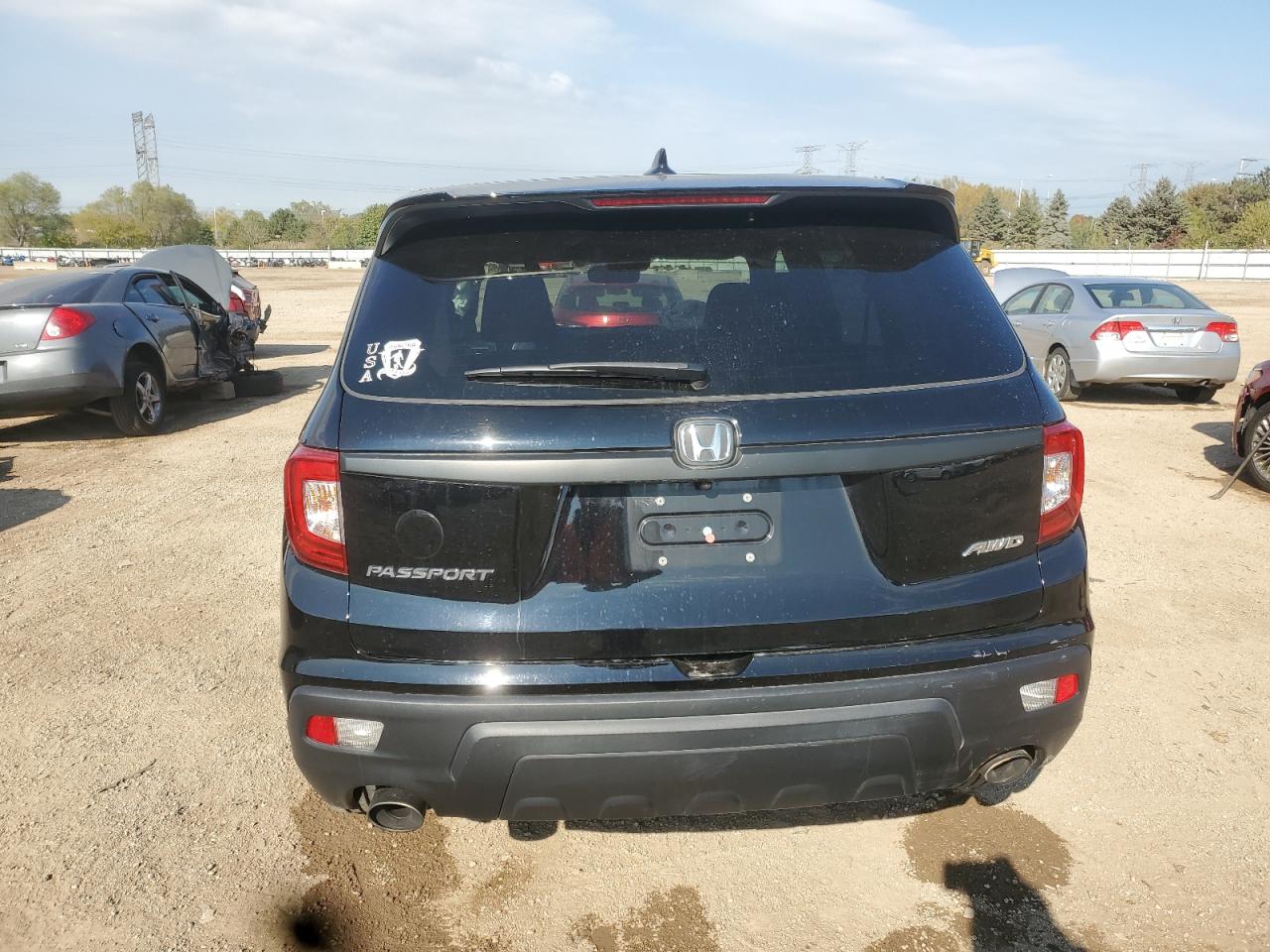 2021 Honda Passport Exl VIN: 5FNYF8H59MB032923 Lot: 86679185