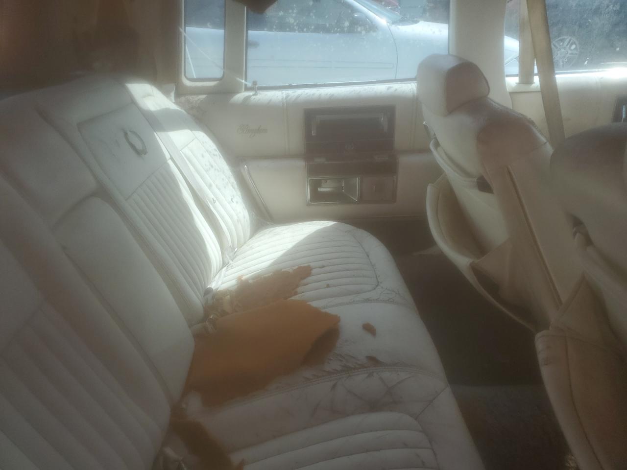 1990 Cadillac Brougham VIN: 1G6DW547XLR707792 Lot: 84542905