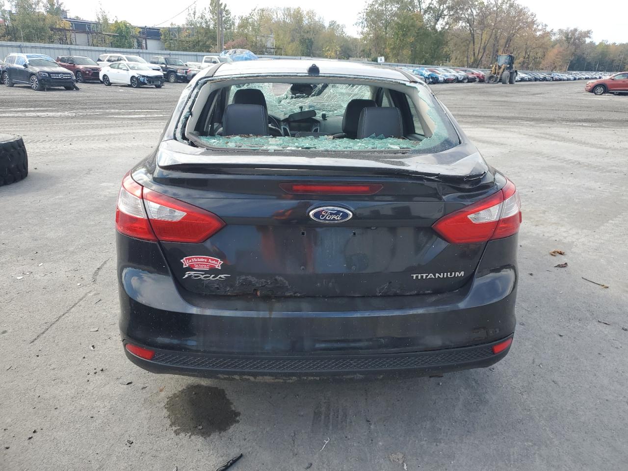 2014 Ford Focus Titanium VIN: 1FADP3J20EL243009 Lot: 81947715