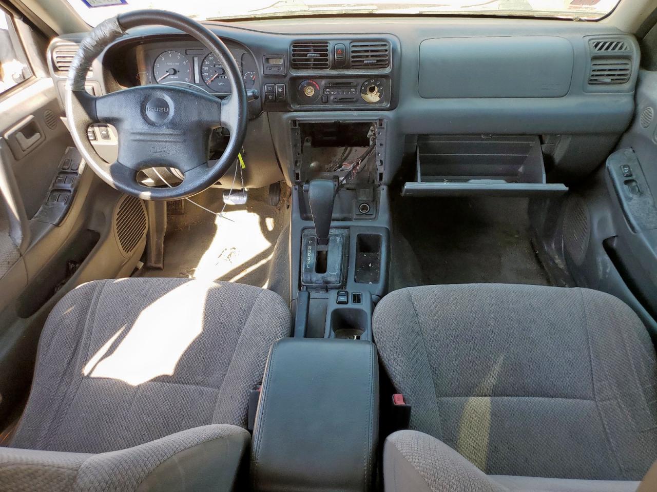 1999 Isuzu Rodeo S VIN: 4S2CK58W1X4381698 Lot: 84927445